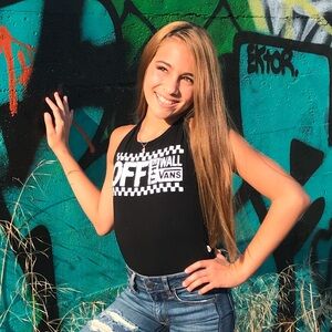 Vans black bodysuits. Size S. White print on front. OFF THE WALL VANS